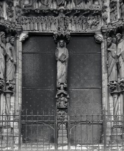 Beau Christ figure on the trumeau of the south portal by French School